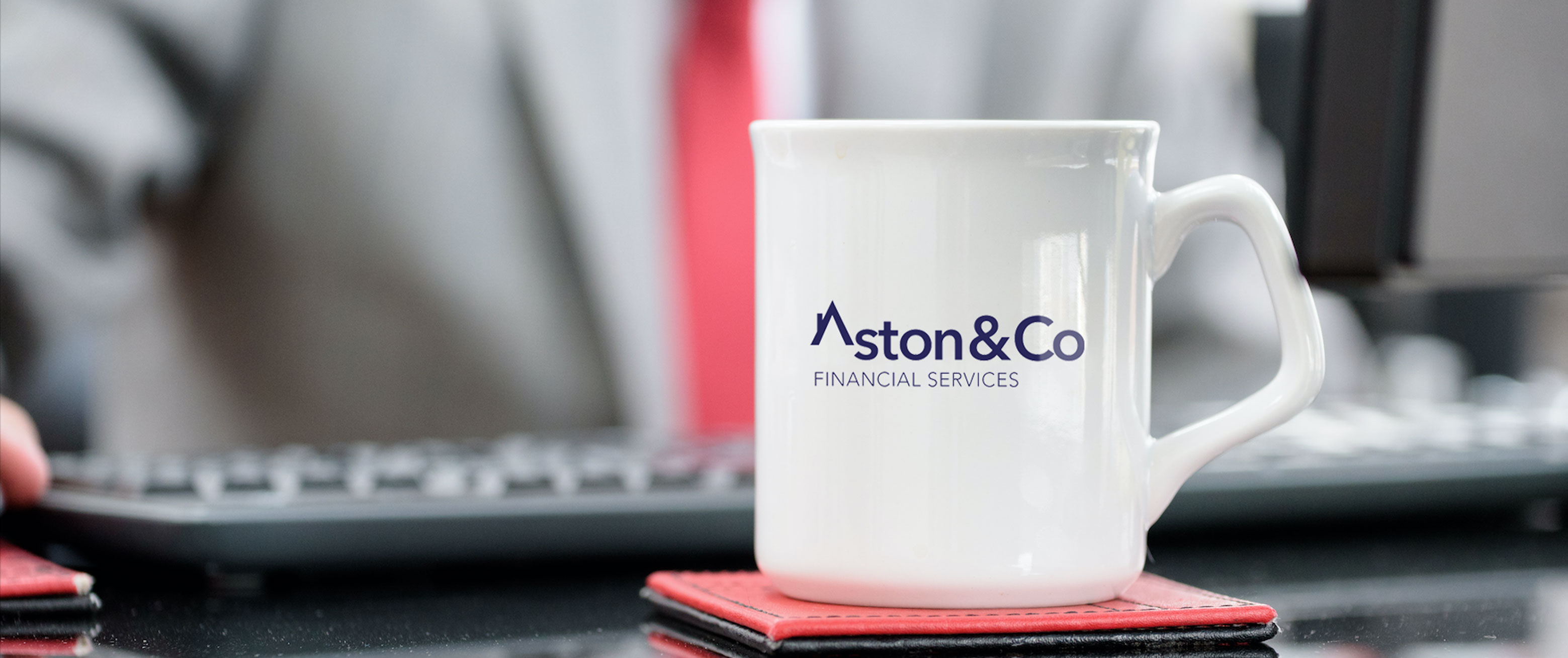 Aston and Co coffee cup in the office